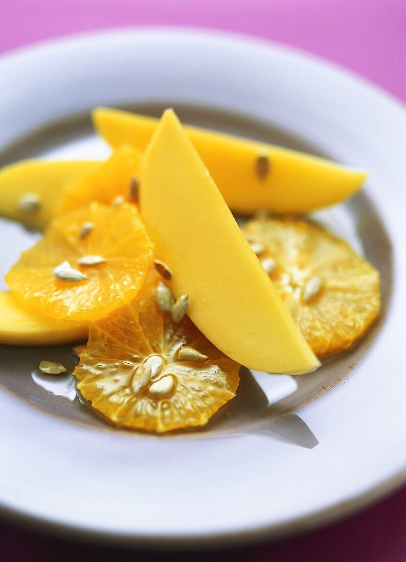 Orange and mango salad with toasted sunflower seeds