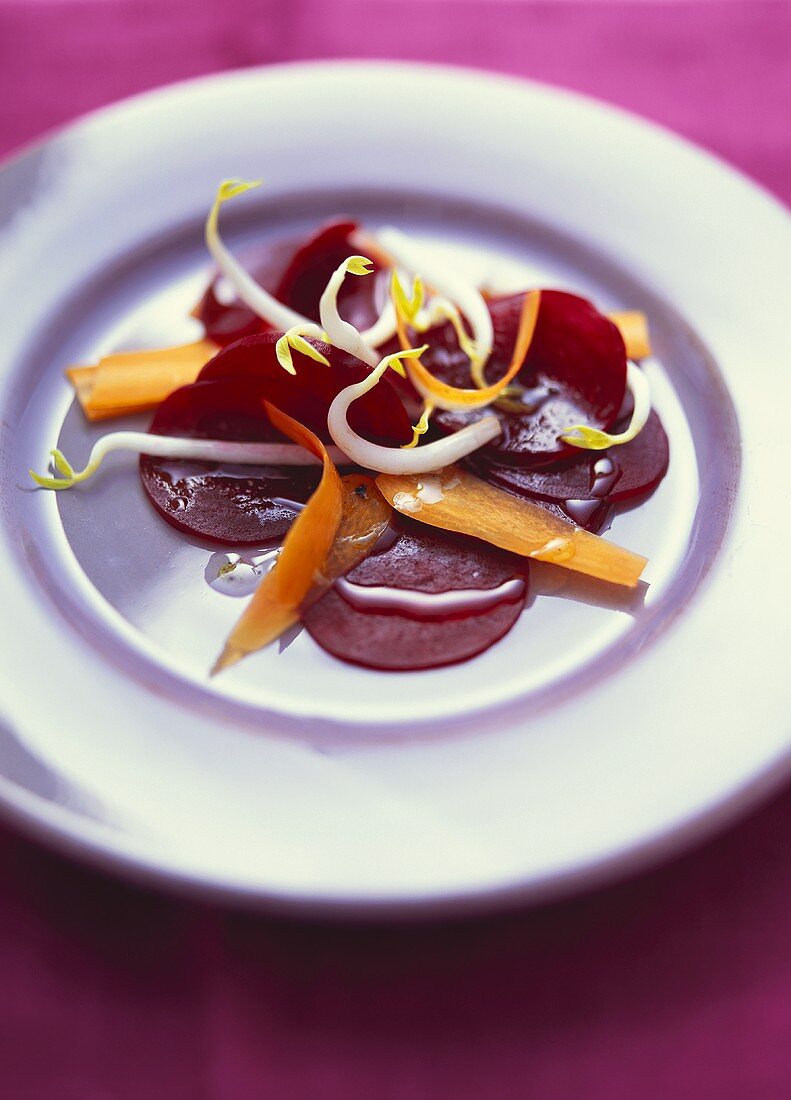 Beetroot salad with carrots and sprouts