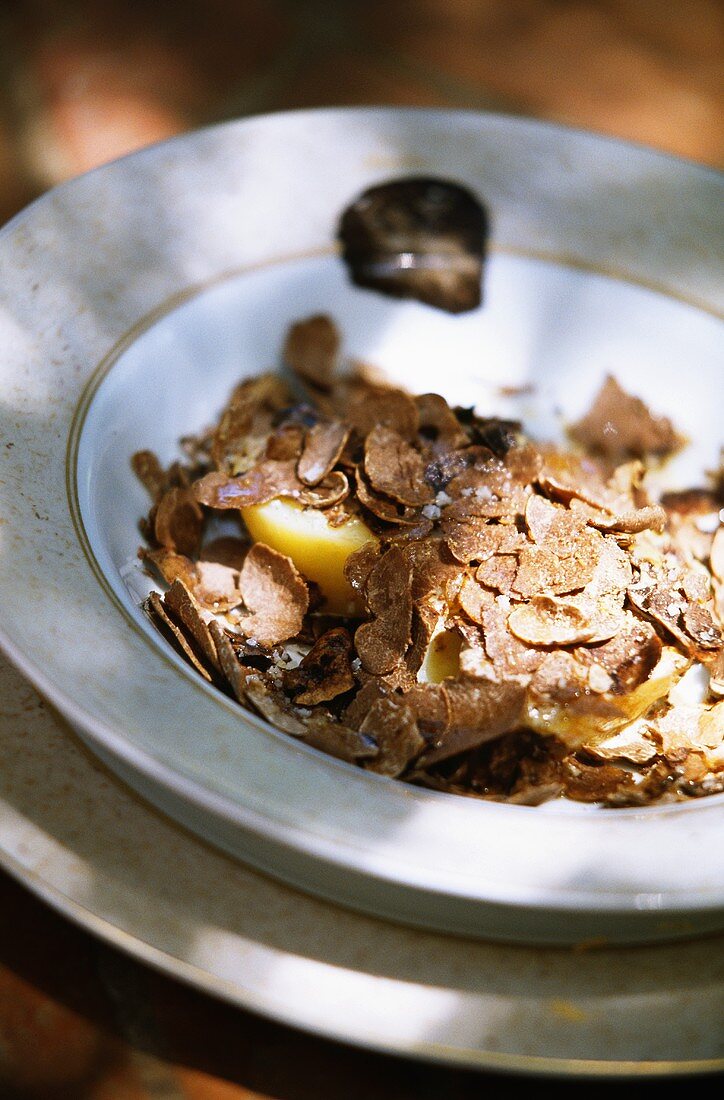 Potatoes with truffle shavings