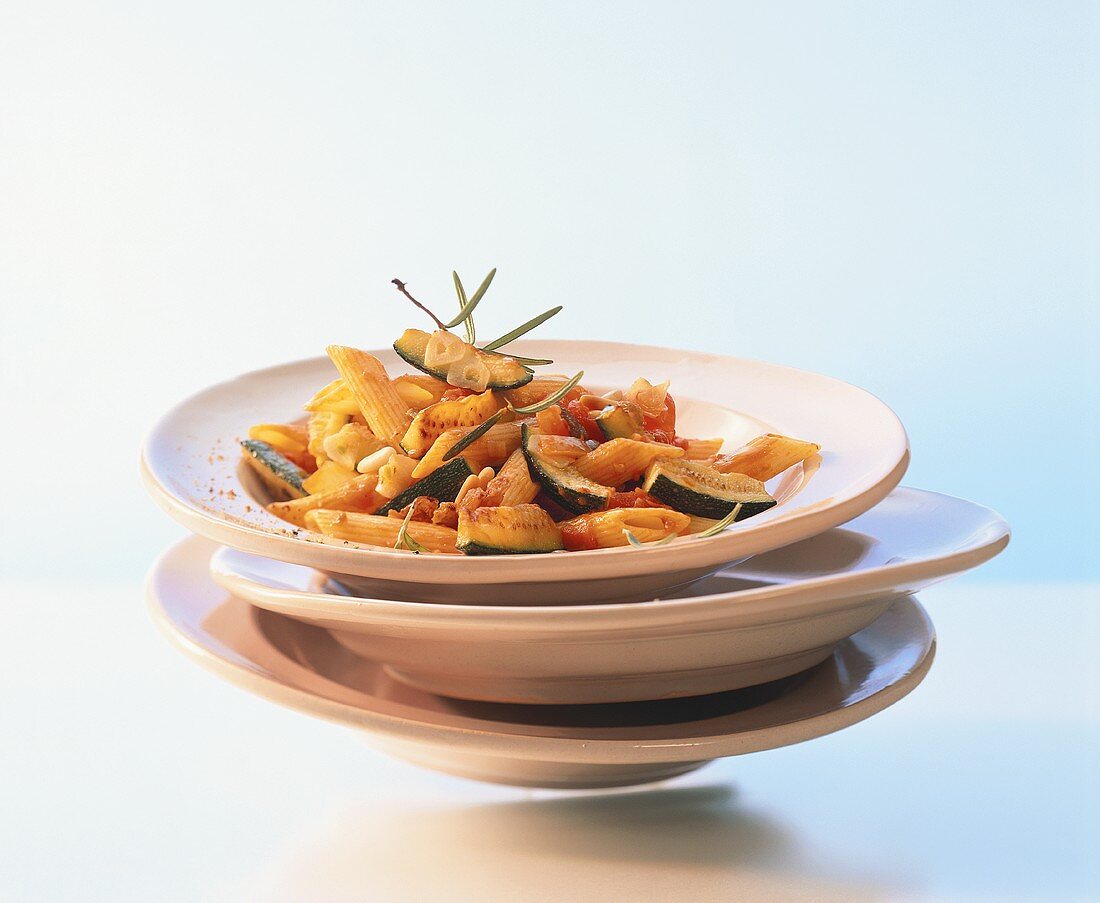 Penne with courgettes and tomato sauce