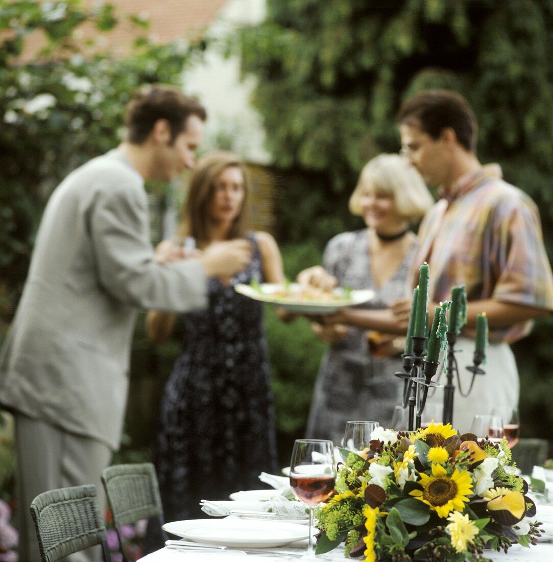 Two Couples at a Garden Party