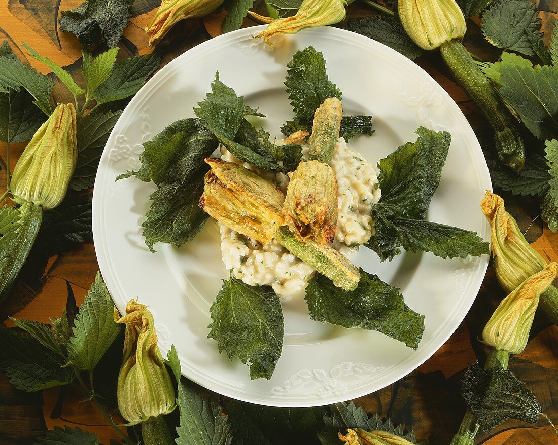 Nettle risotto with deep-fried courgette flowers