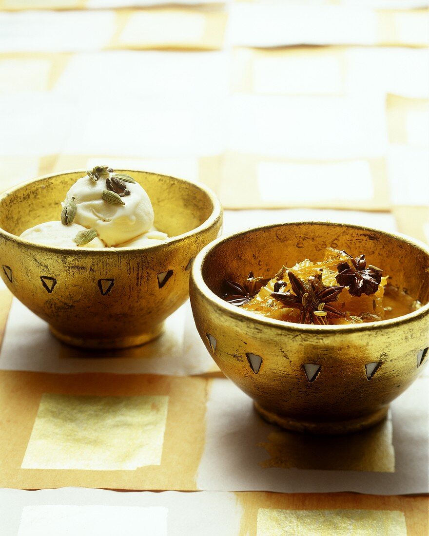 Bottled oranges and cardamom ice cream in bowls