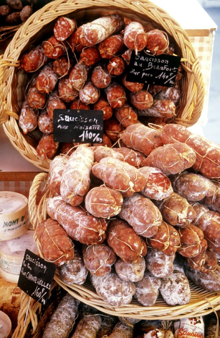 Stand with various types of salami; France