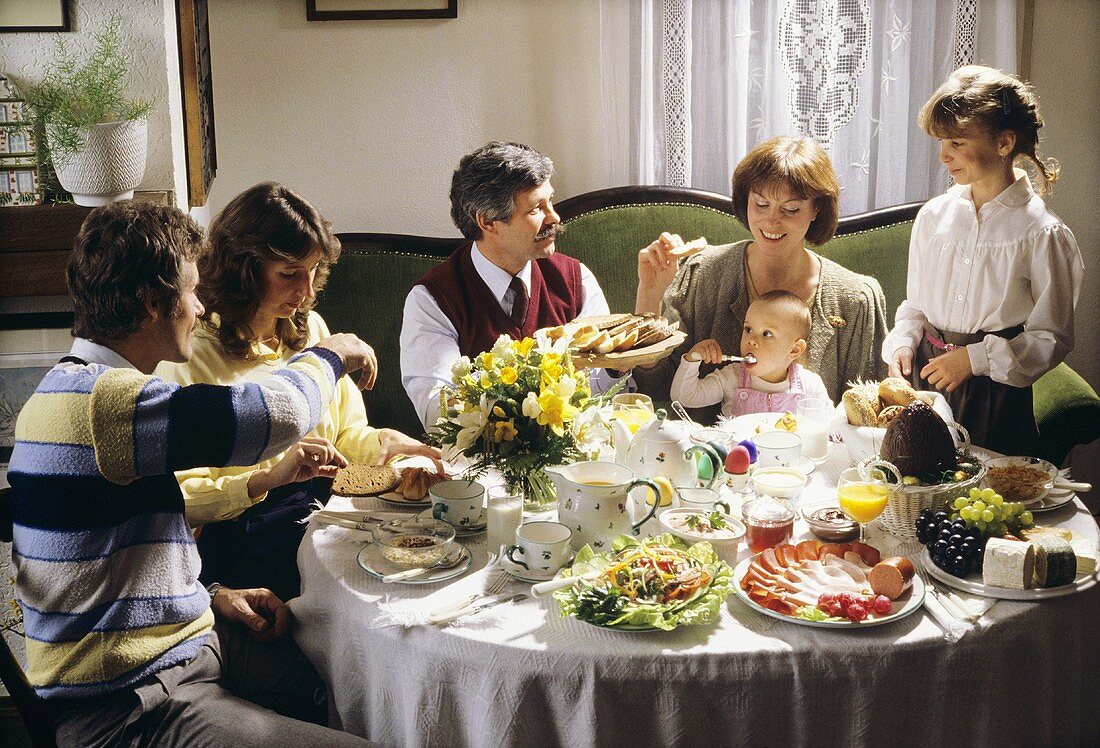 Family at table for Easter breakfast