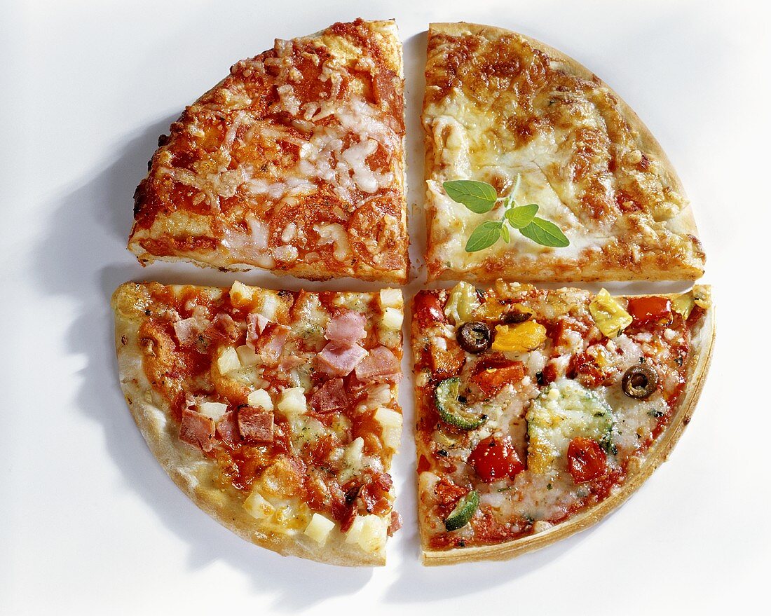 Four pizza quarters with different toppings