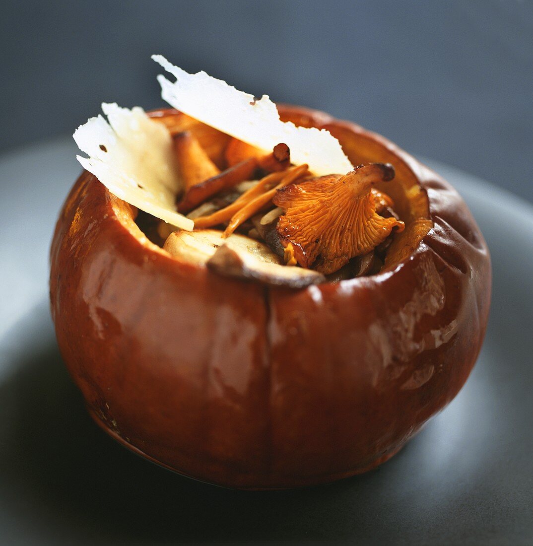 Pumpkin with mushroom stuffing and Parmesan shavings