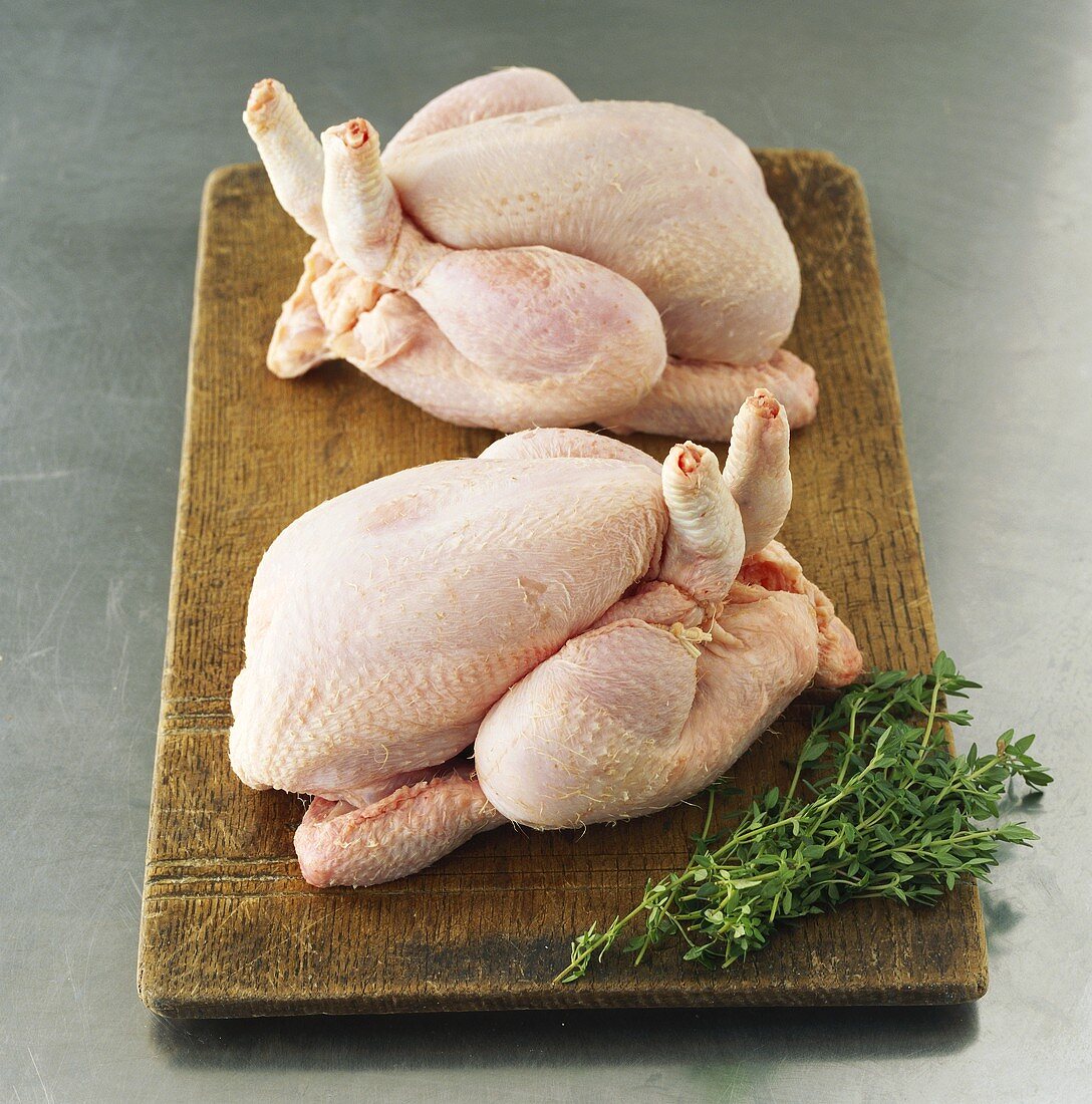 Fresh pullets on chopping board