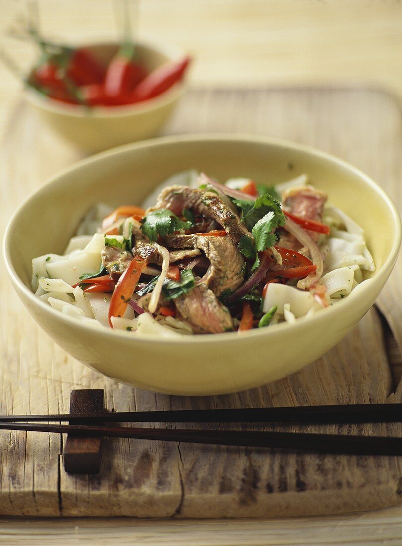 Rice noodle salad with beef, coriander and palm sugar