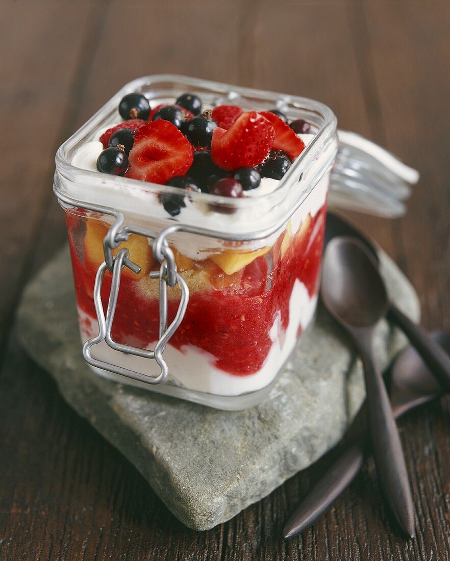 Fruit trifle in storage jar