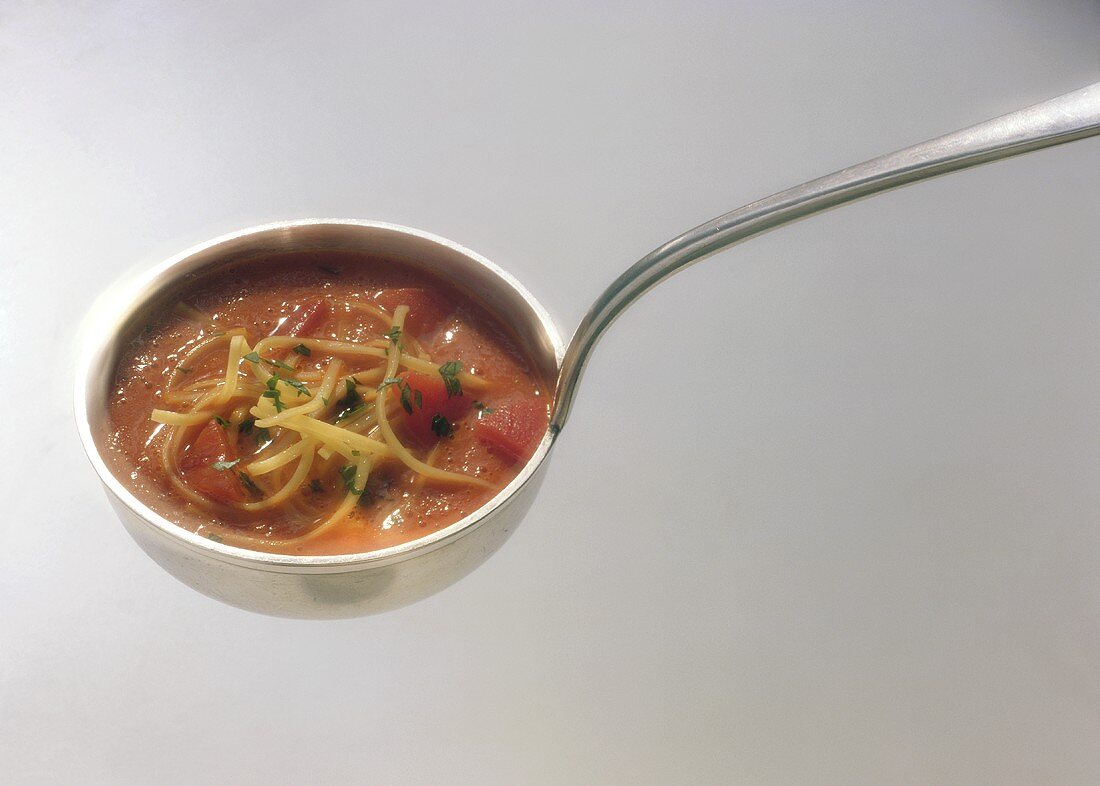 Soup Ladle with Pasta in Bell Pepper Mousse