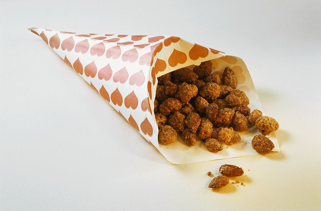 Roast almonds in a paper bag
