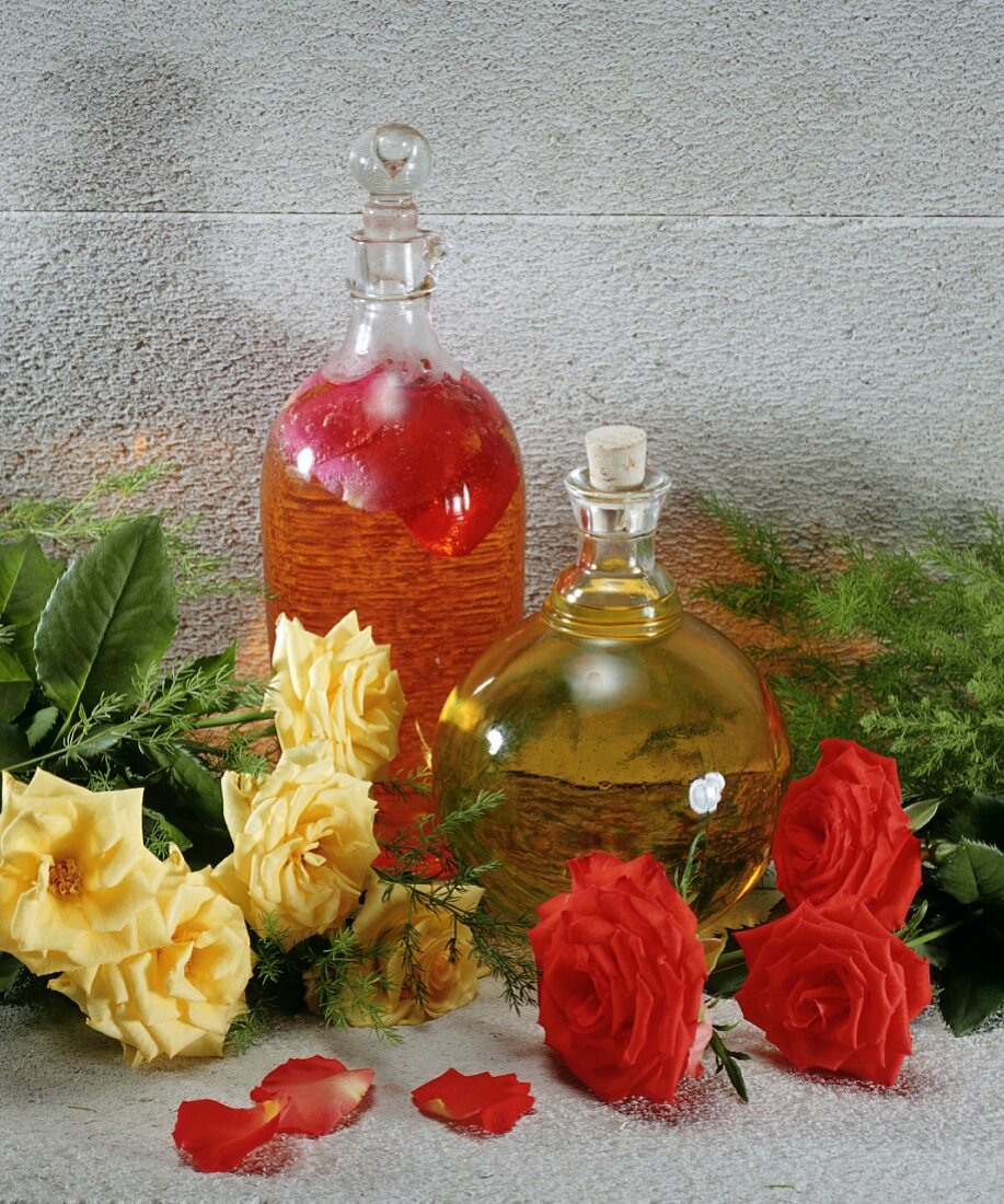 A bottle of rose vinegar & a bottle of rose-hip syrup