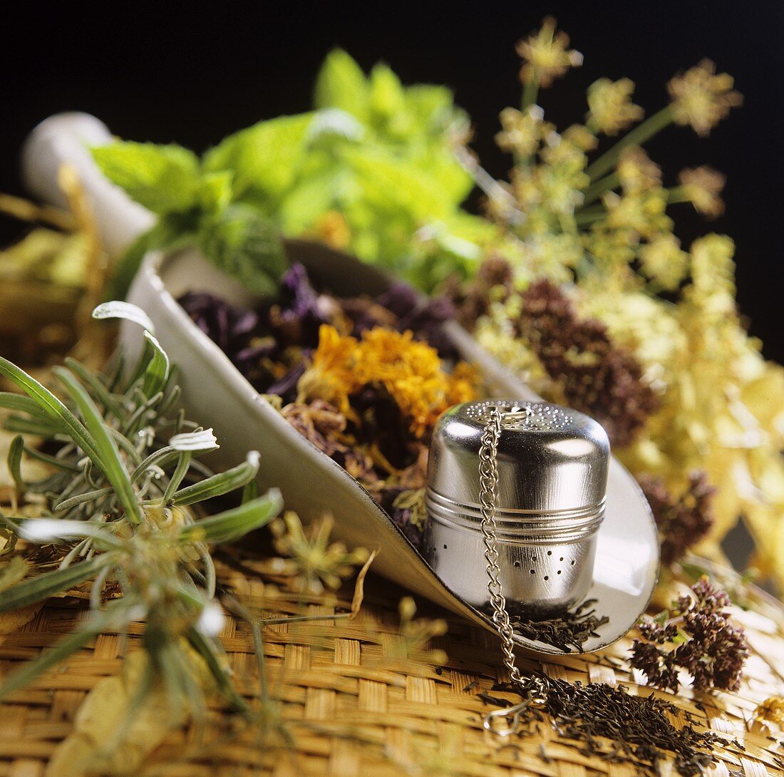 Dried flowers and herbs with a tea-ball