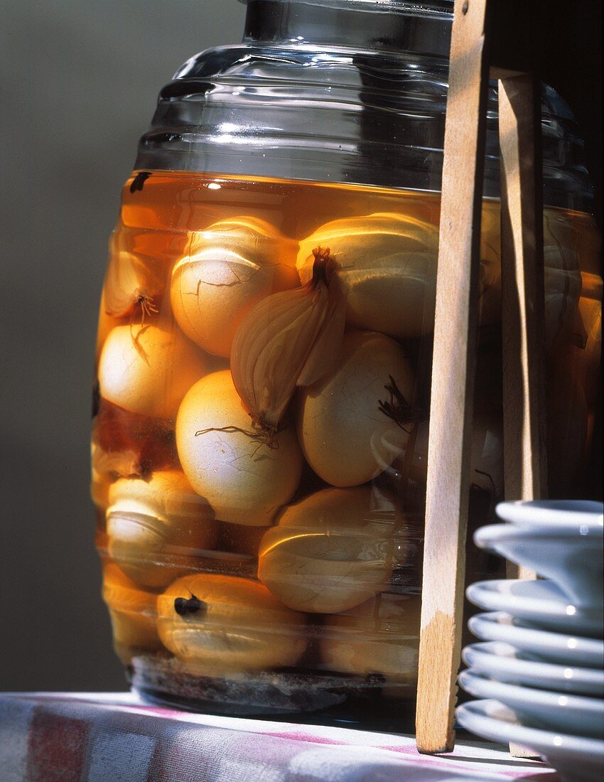 Pickled hard-boiled eggs (Solei) in a jar