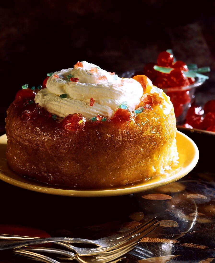 Baba au rhum with whipped cream