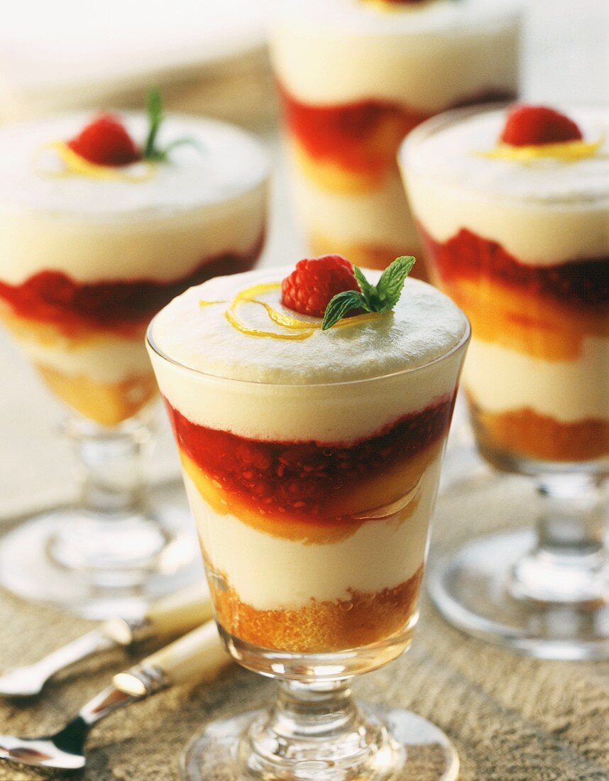 Layered peach and raspberry sundae