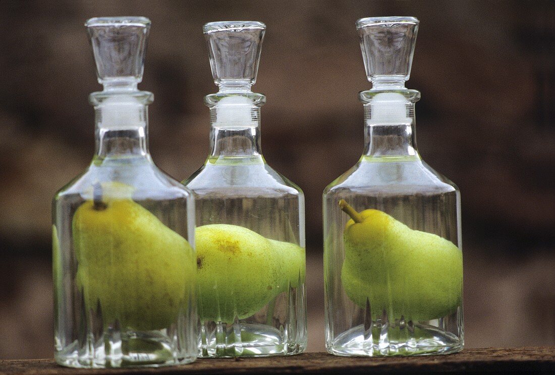 Pear schnapps with whole pear in the bottle, Alsace