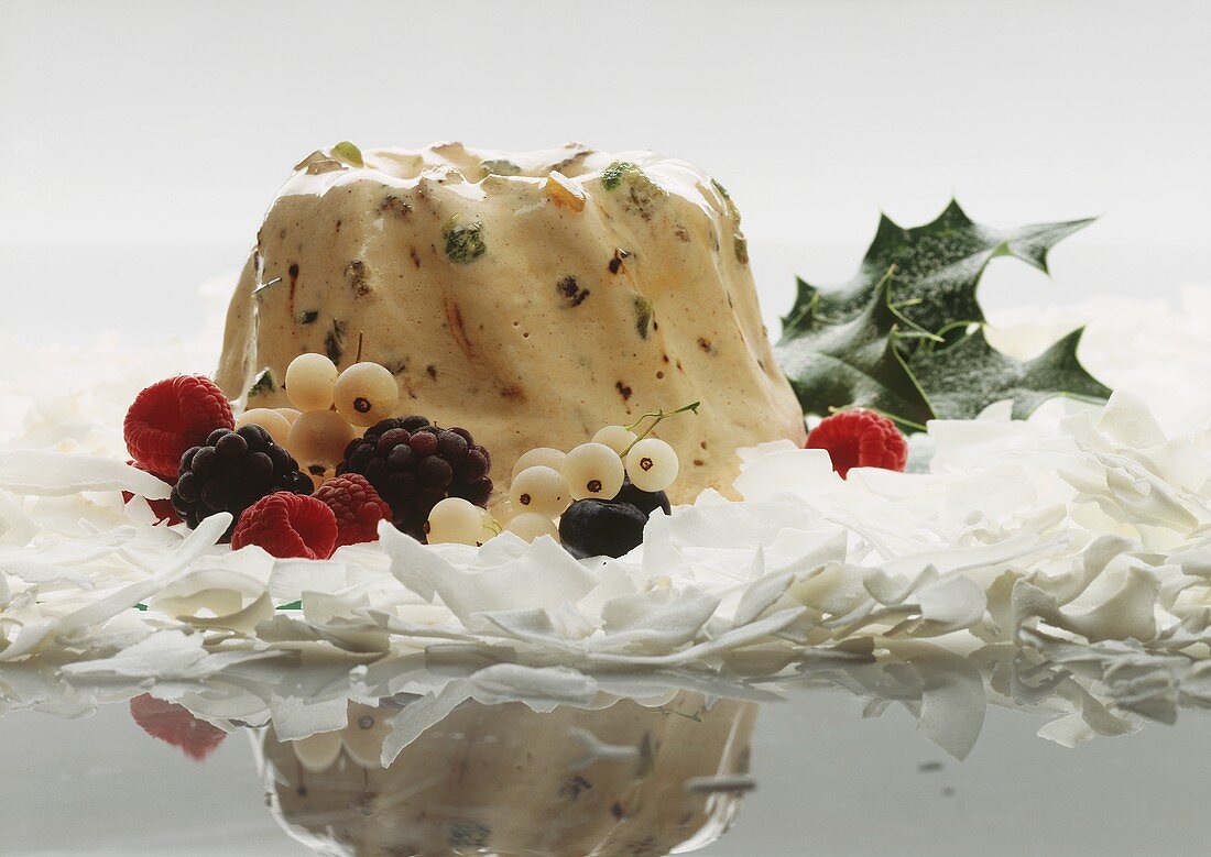 Ice cream gugelhupf with frozen berries and coconut chips