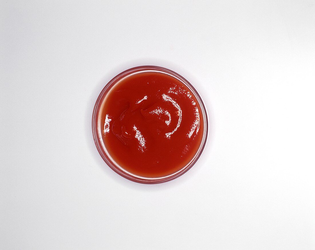 Ketchup in small glass bowl
