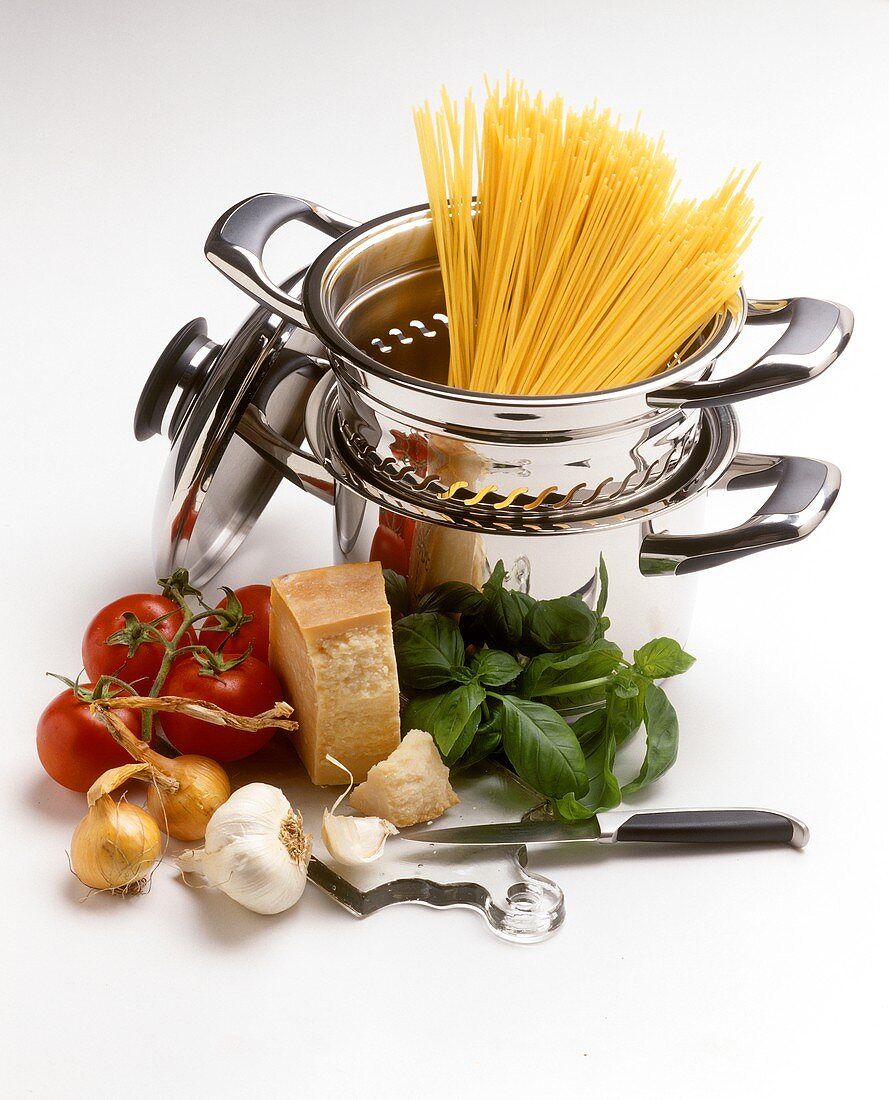 Ingredients for pasta sauces & spaghetti in pan