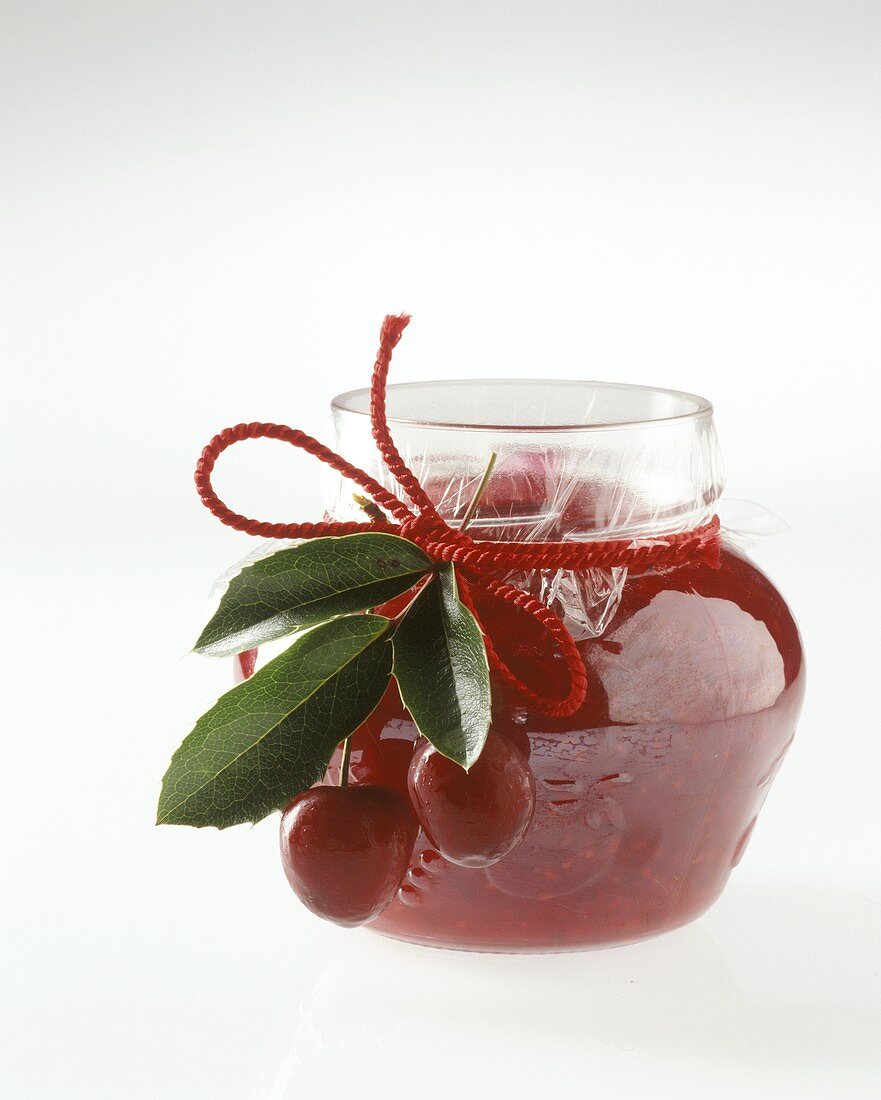 A jar of cherry jam as a gift