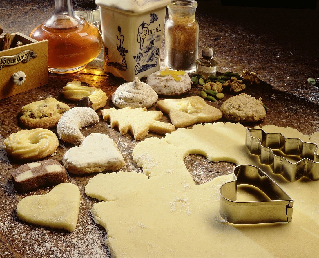 Various biscuits and dough with cutters