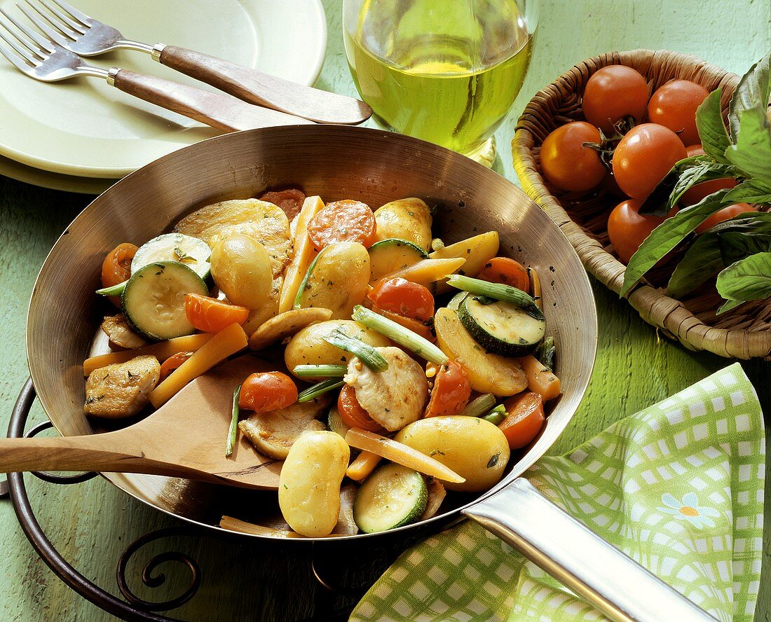 Fried potato and vegetable with chicken breast