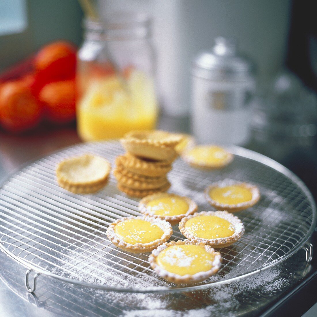 Lemon tartlets on draining rack