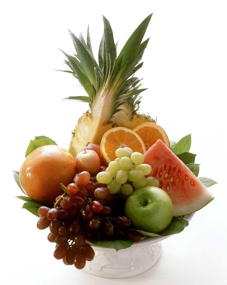 Fruit bowl with grapes, melon, pineapple etc.
