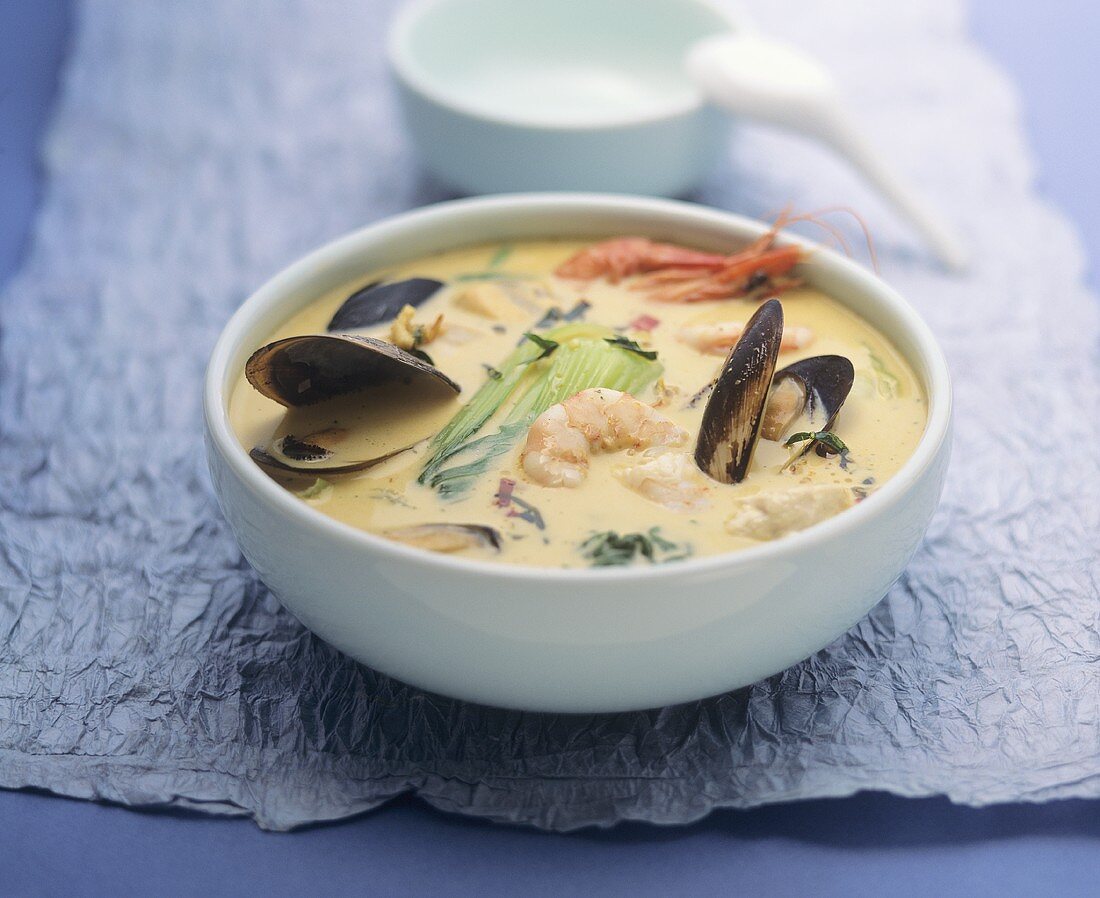 Seafood stew with coconut milk and mint (seafood laksa)