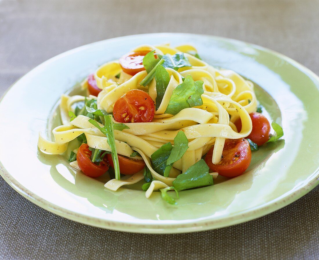 Ribbon pasta with rocket and cherry tomatoes