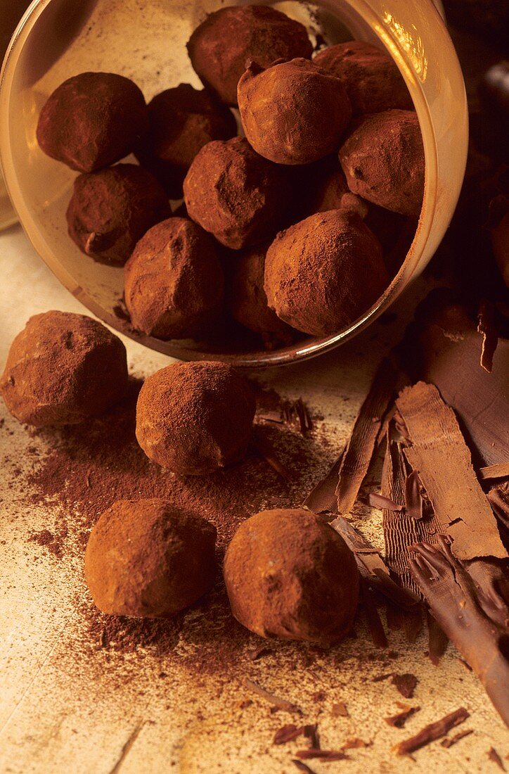 Chocolate truffles, some in box