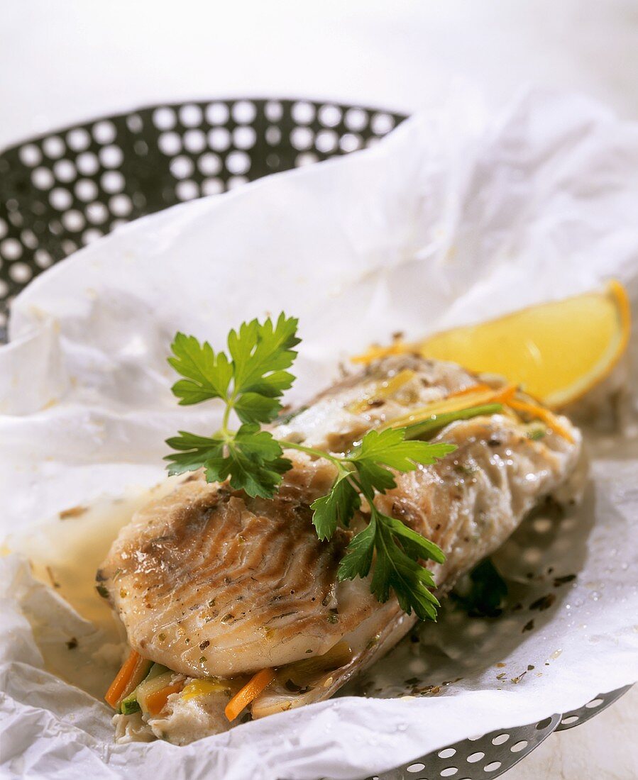 Steamed coley roulades with vegetable filling