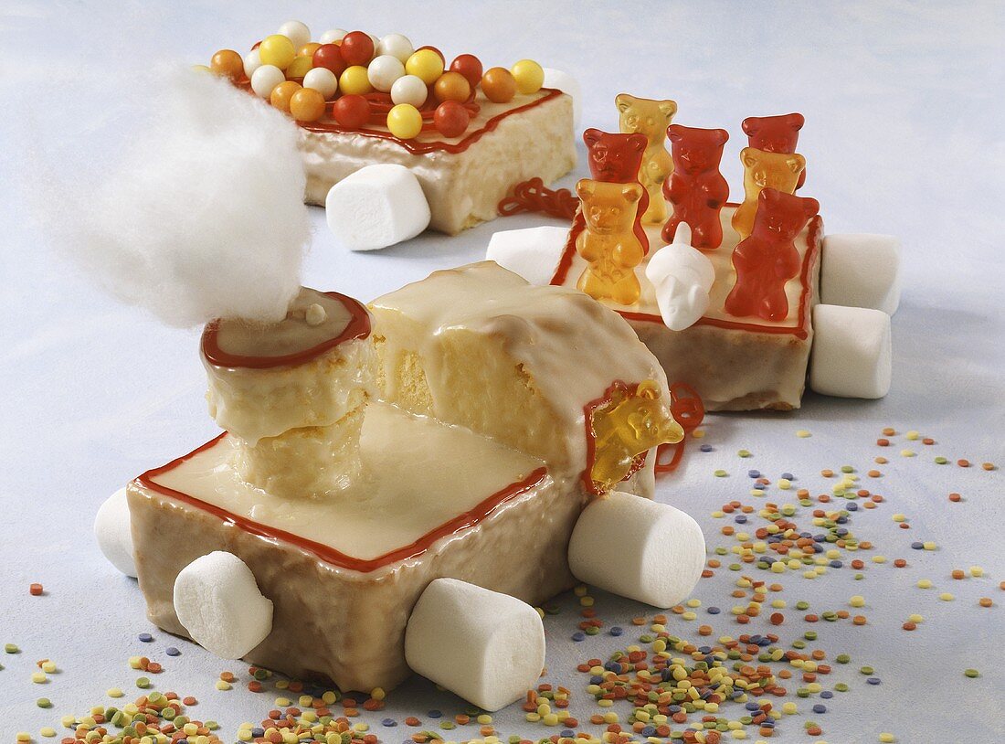 Train cake with marshmallows and gummi bears for children