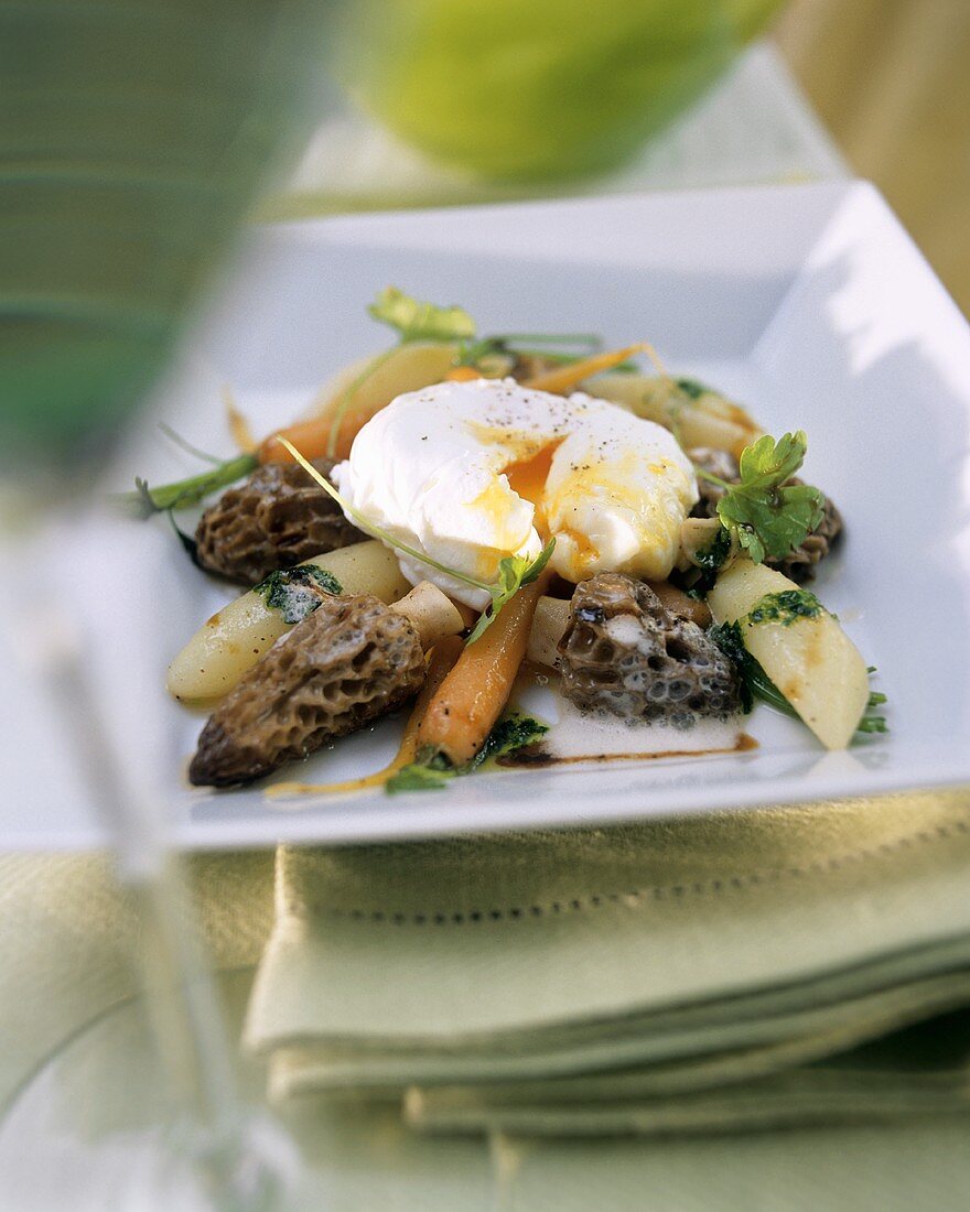 Morel and carrot ragout with poached egg