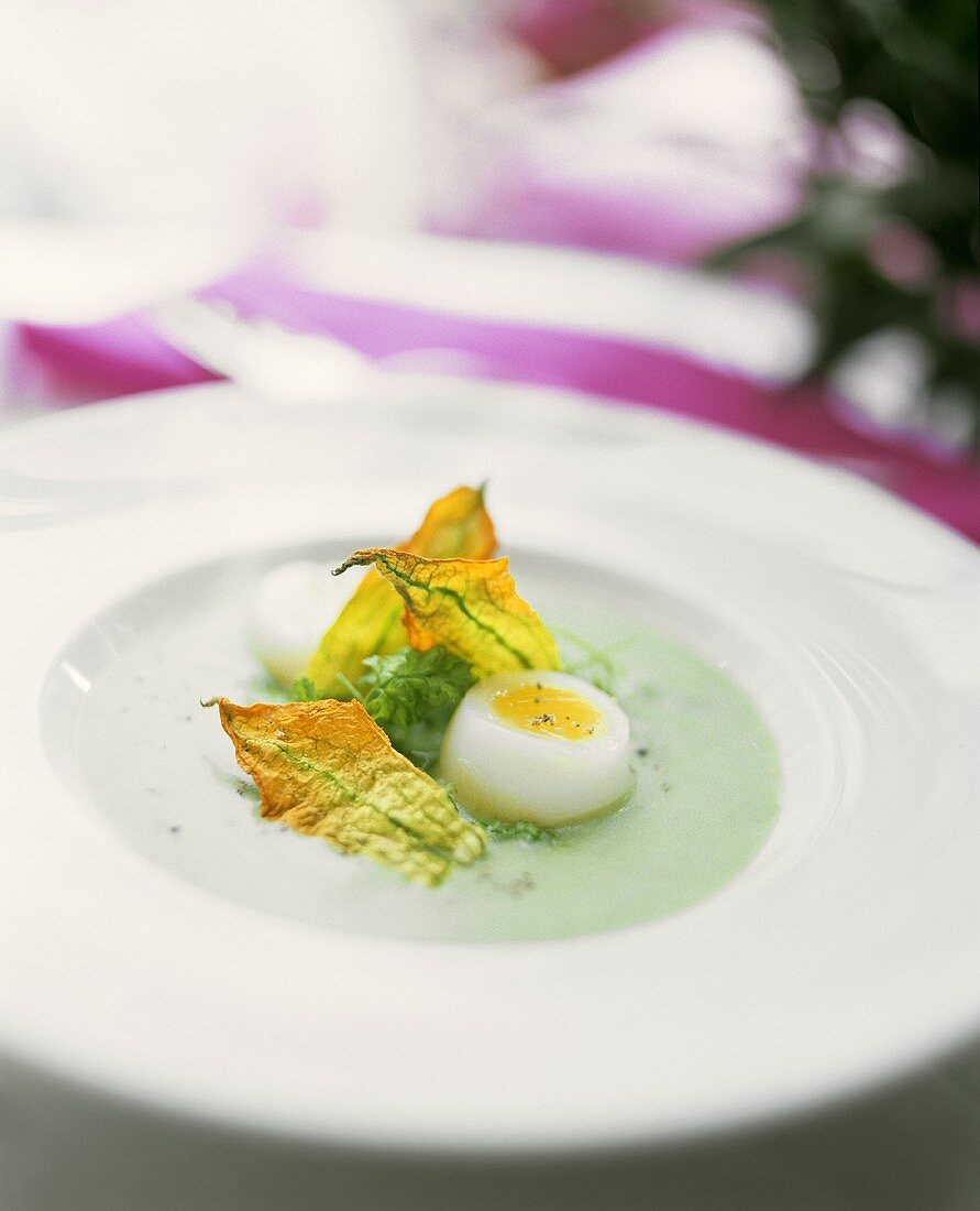 Chervil soup with quail's eggs