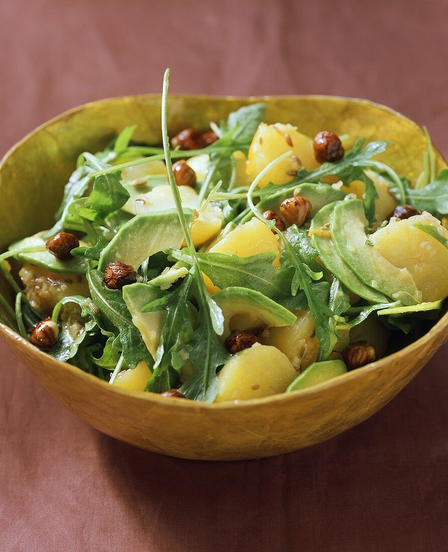 Potato salad with hazelnuts, avocado and rocket