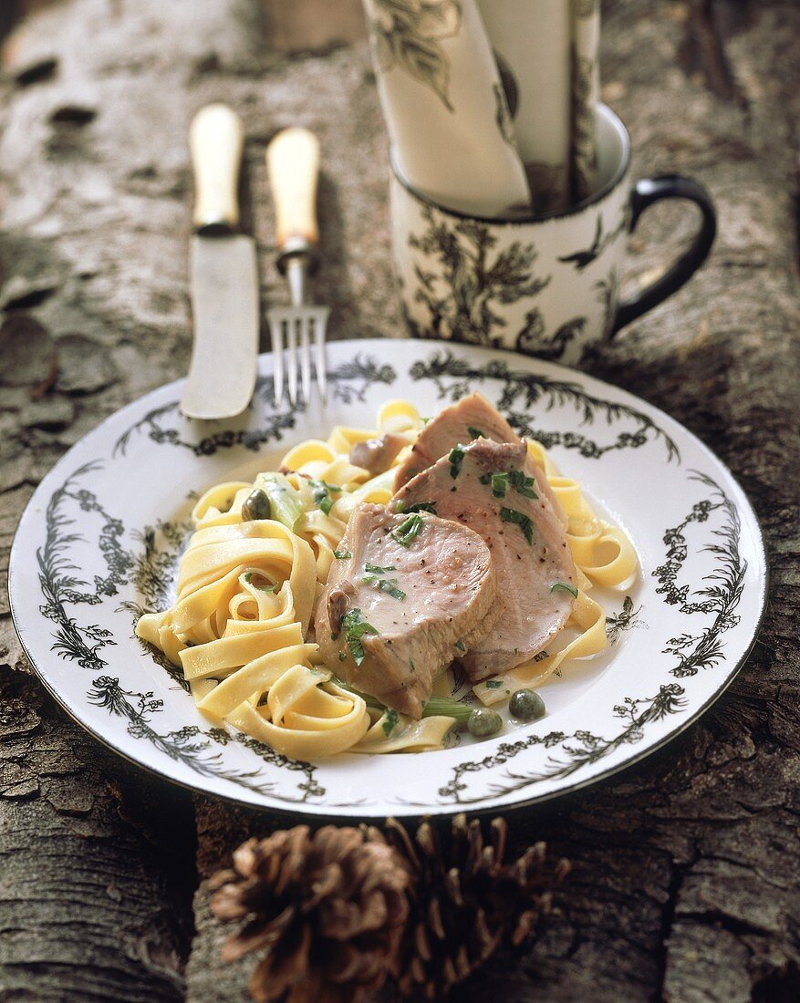 Veal loin braised in milk with anchovies and ribbon pasta