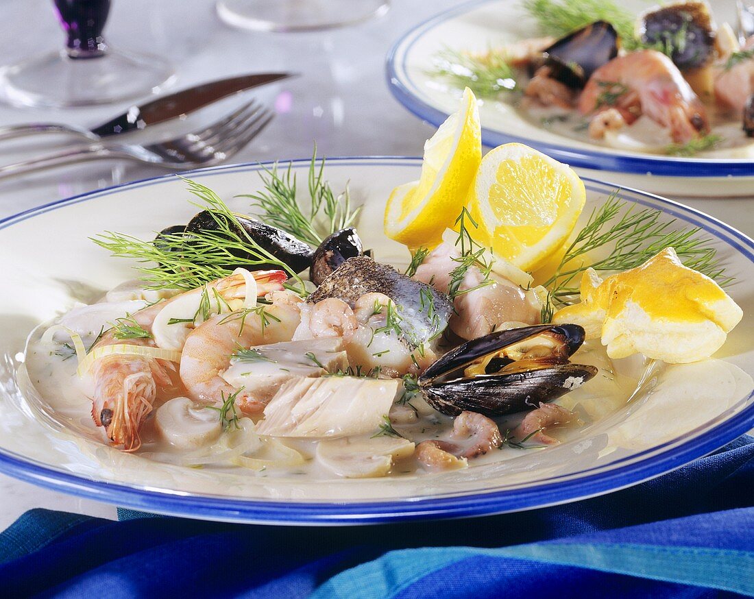 Pan-cooked fish dish with seafood and dill sauce (Sweden)