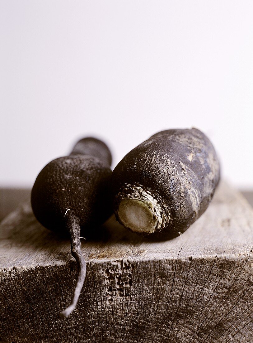 Two black radishes