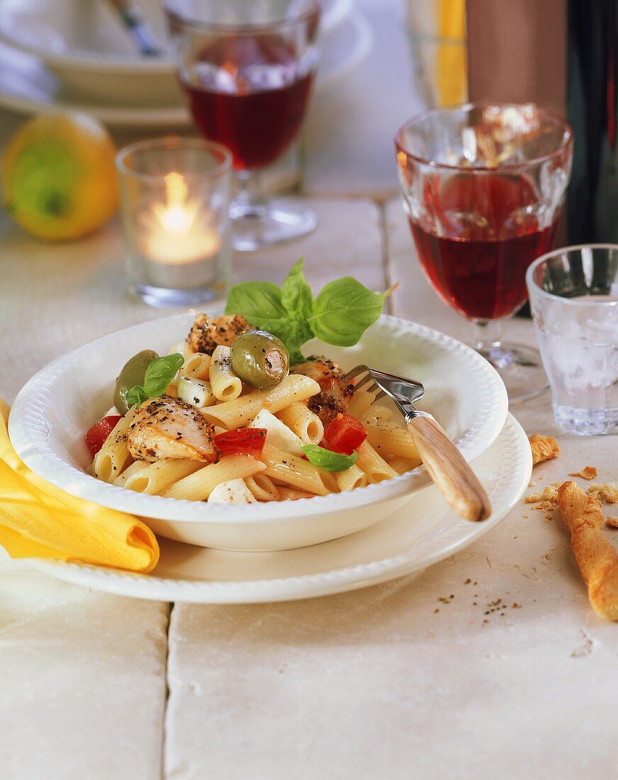 Penne with chicken, olives, tomatoes & mozzarella; red wine