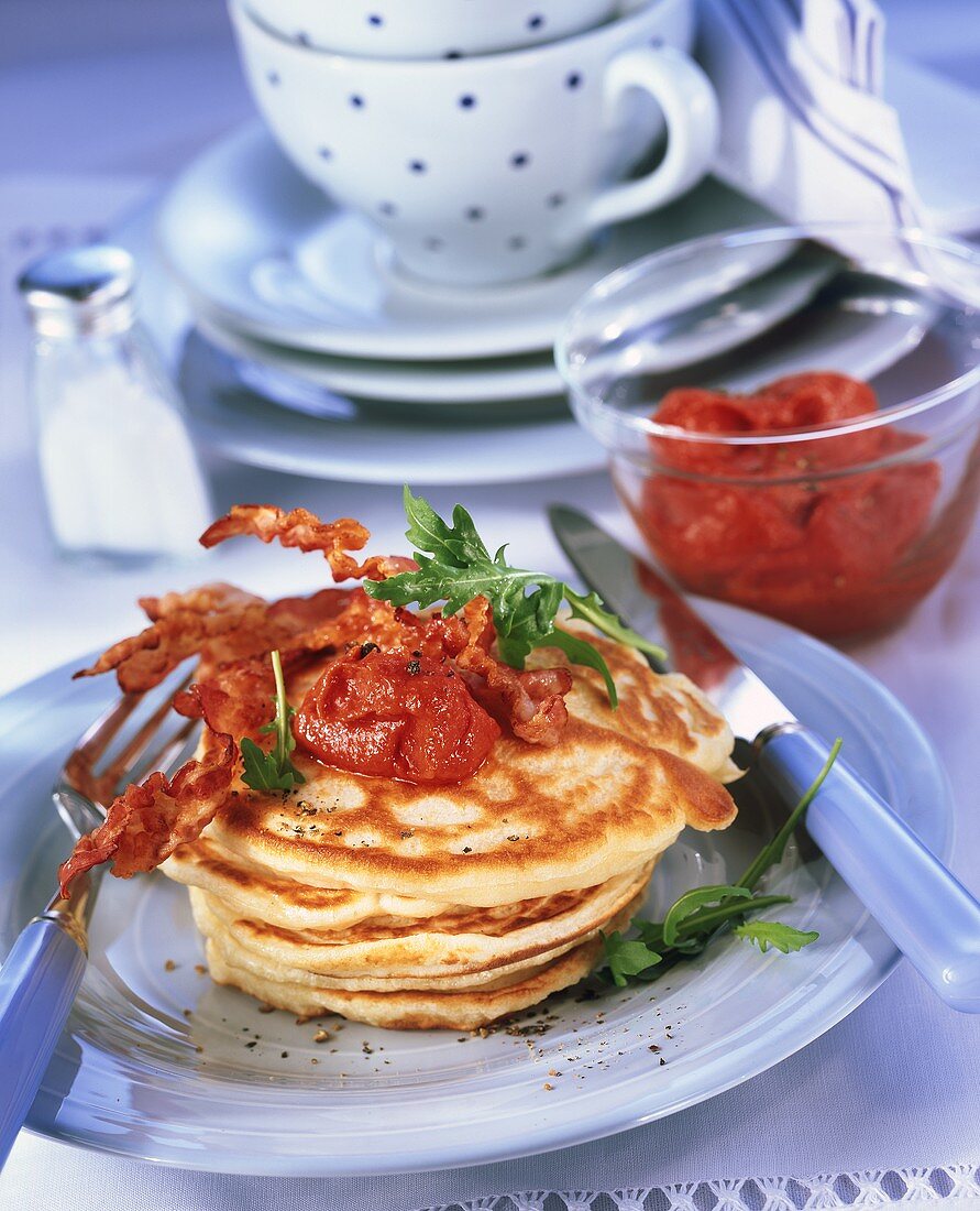 Hearty pancakes with bacon and tomato butter