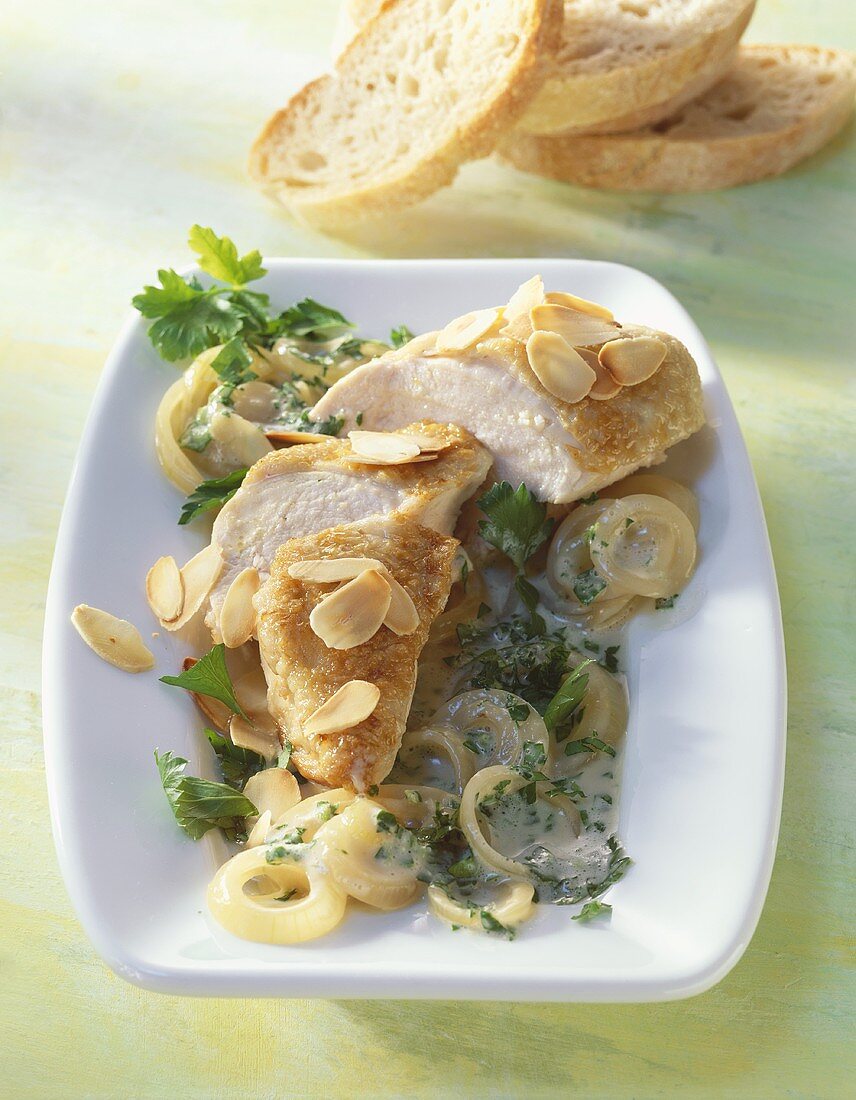 Chicken breast with toasted almonds in sherry & onion sauce