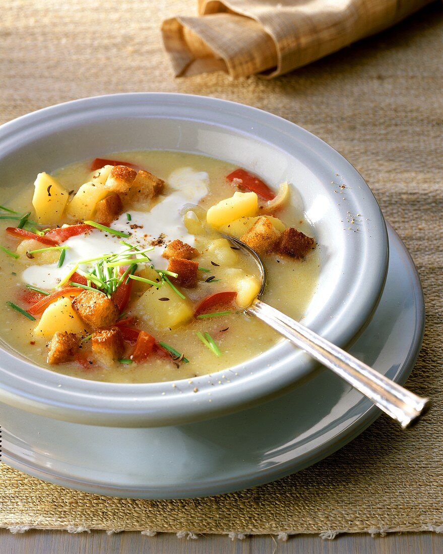 Potato and pepper soup with sour cream
