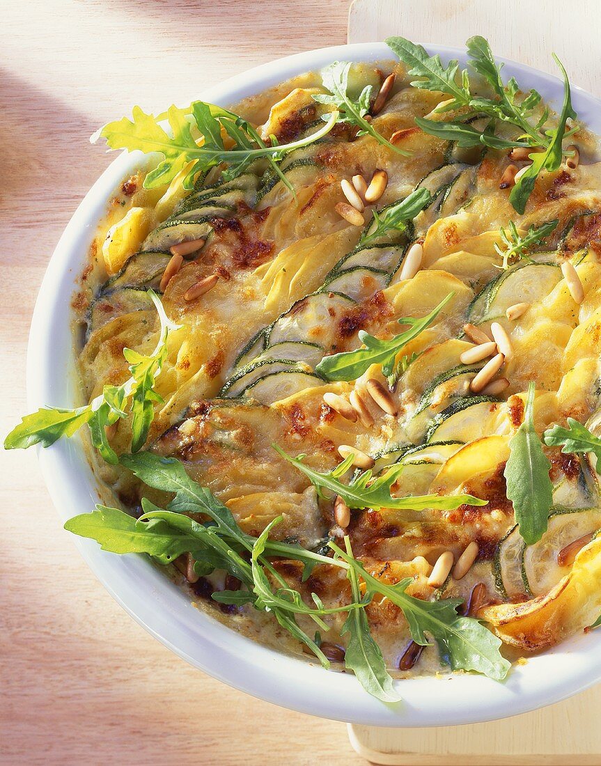 Potato and courgette gratin with rocket