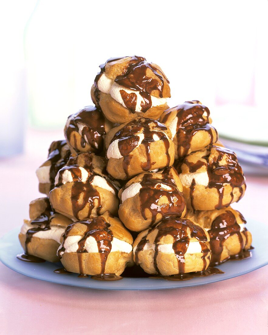 Lots of profiteroles on a plate