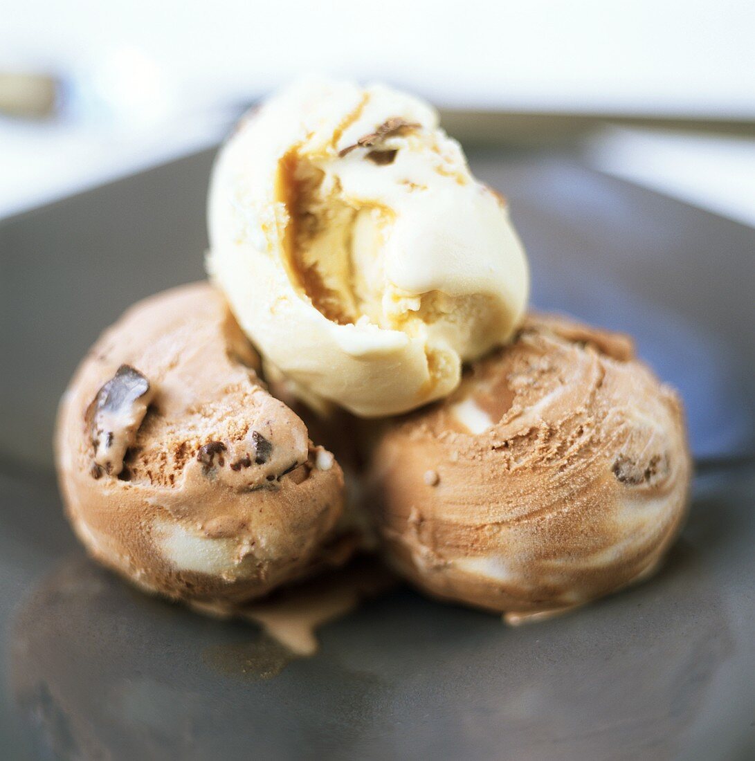 Two scoops of chocolate & one scoop of vanilla ice cream