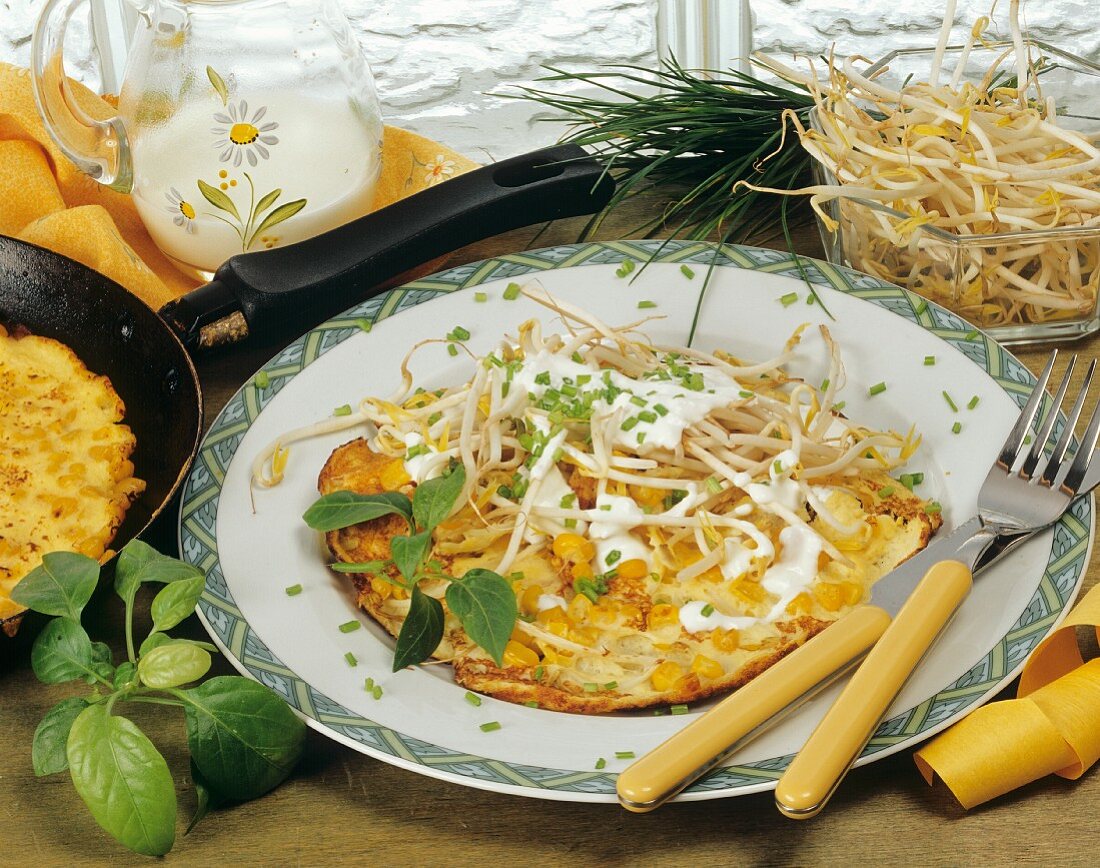 Omelette with sweetcorn and soya sprouts