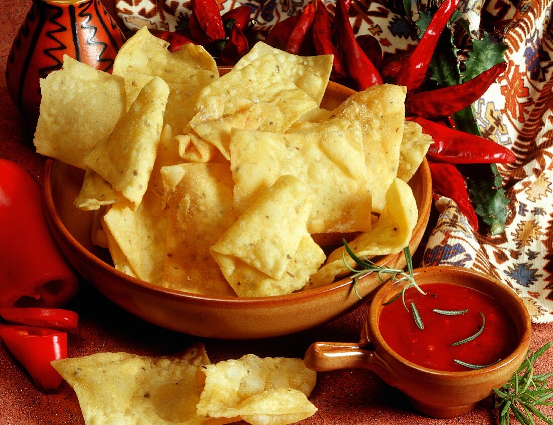 Corn chips with spicy pepper sauce